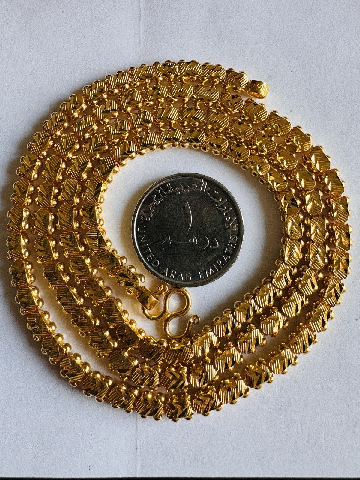 7098884