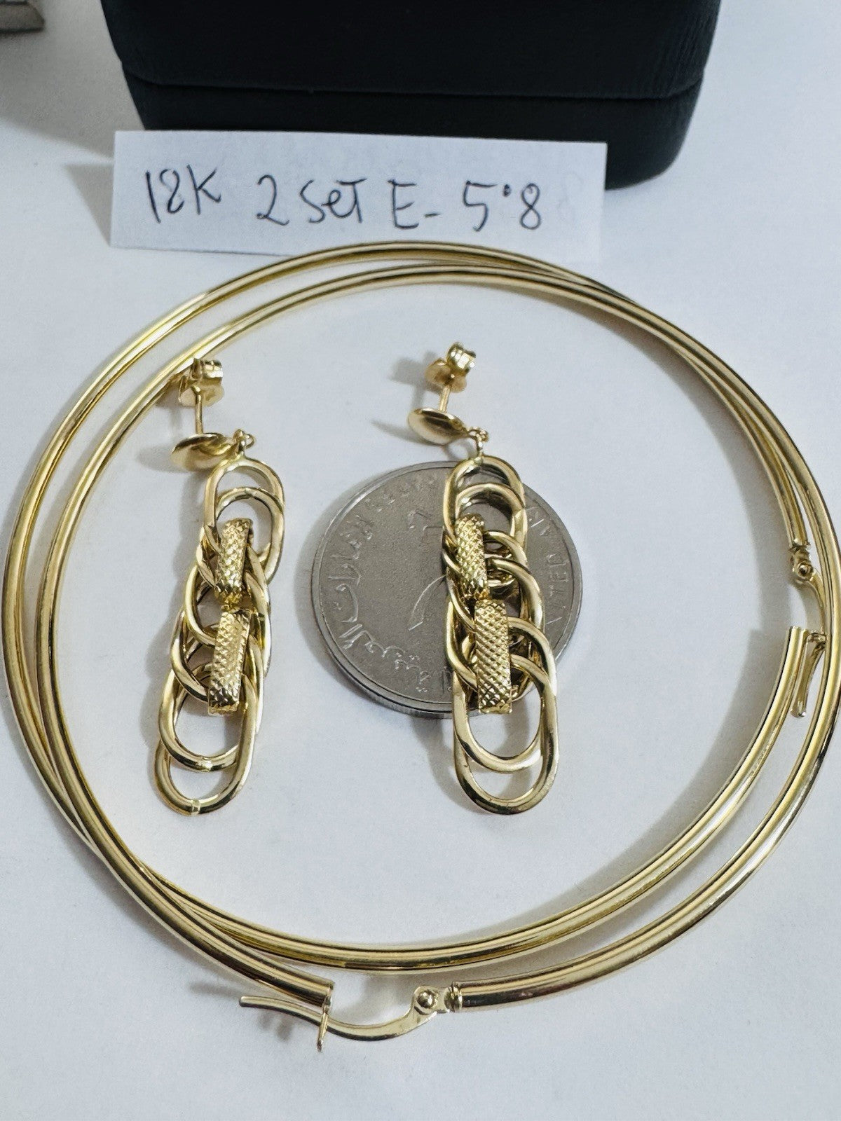 6915972